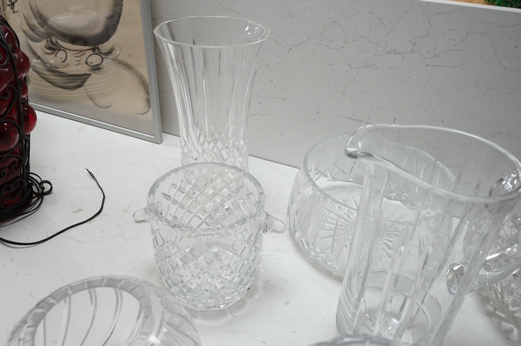 Four heavy cut glass bowl, two ice buckets, cocktail shaker, etc. Tallest vase height 30cm